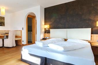Residence - Hotel Alpinum - Quartos