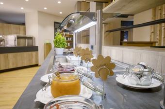 Hotel Früchtl - Αίθουσα πρωϊνού