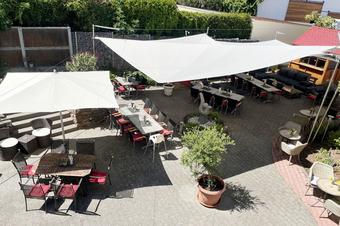 Tacheles Landrestaurant und G&auml;stehaus Schmitt - Biergarten
