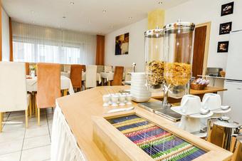 Hotel Garni Metzingen - Sala para pequeno-almoço