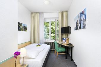 Hotel Am Hofgarten - Quartos