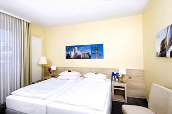 Hotel Am Hofgarten - Kamer