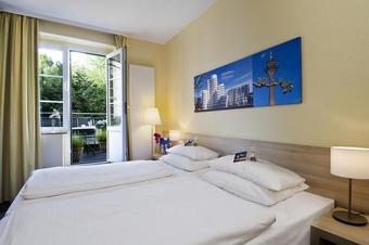 Hotel Am Hofgarten - Kamer